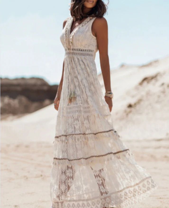Elegant women's maxi dress featuring a vintage boho print and an adjustable drawstring waist for a flattering fit.