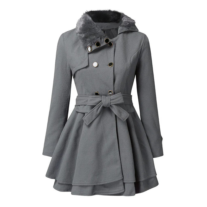 Women's vintage double-breasted trench coat. Elegant long outerwear, perfect for autumn & winter fashion.