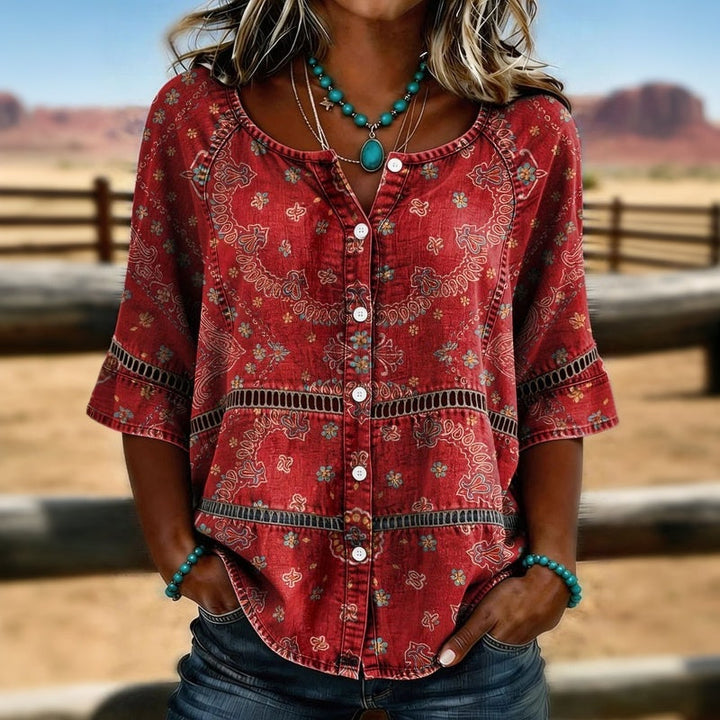 Elegant women's ethnic print v-neck blouse. Vintage-inspired, three-quarter sleeve top, casual spring/summer.