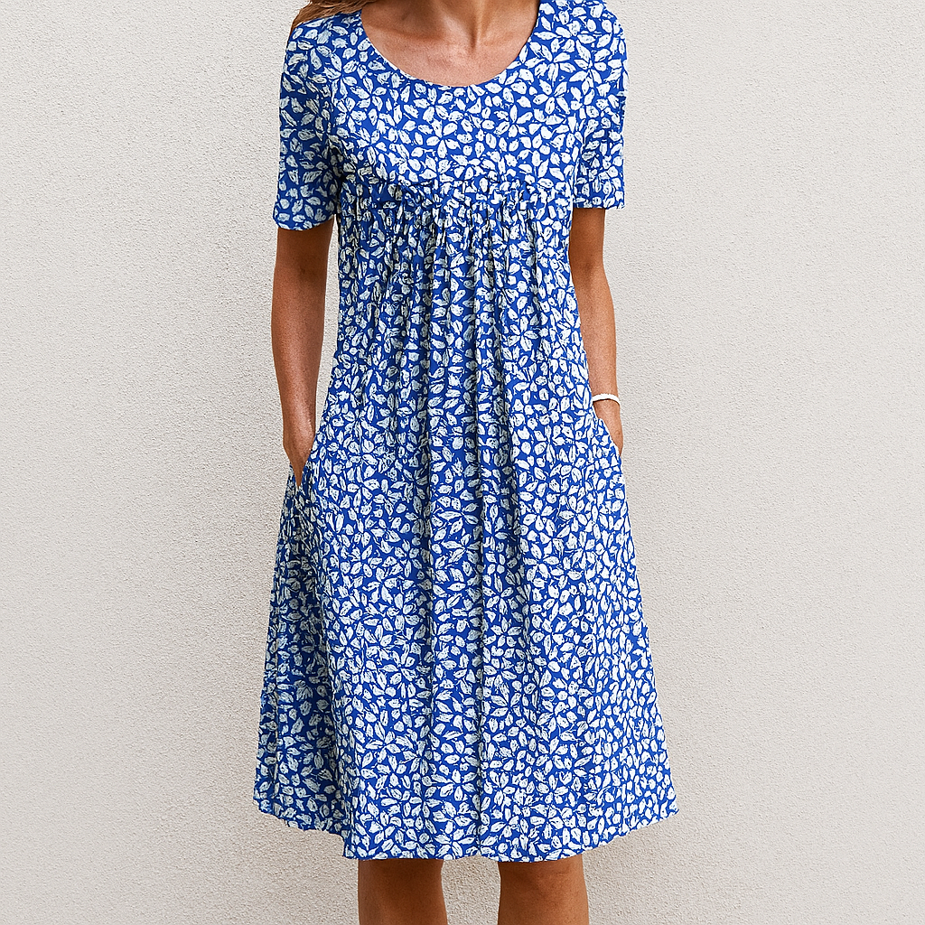 Effortless A-line women's floral summer dress featuring ruffles, short sleeves, ideal for vintage-inspired casual outings.