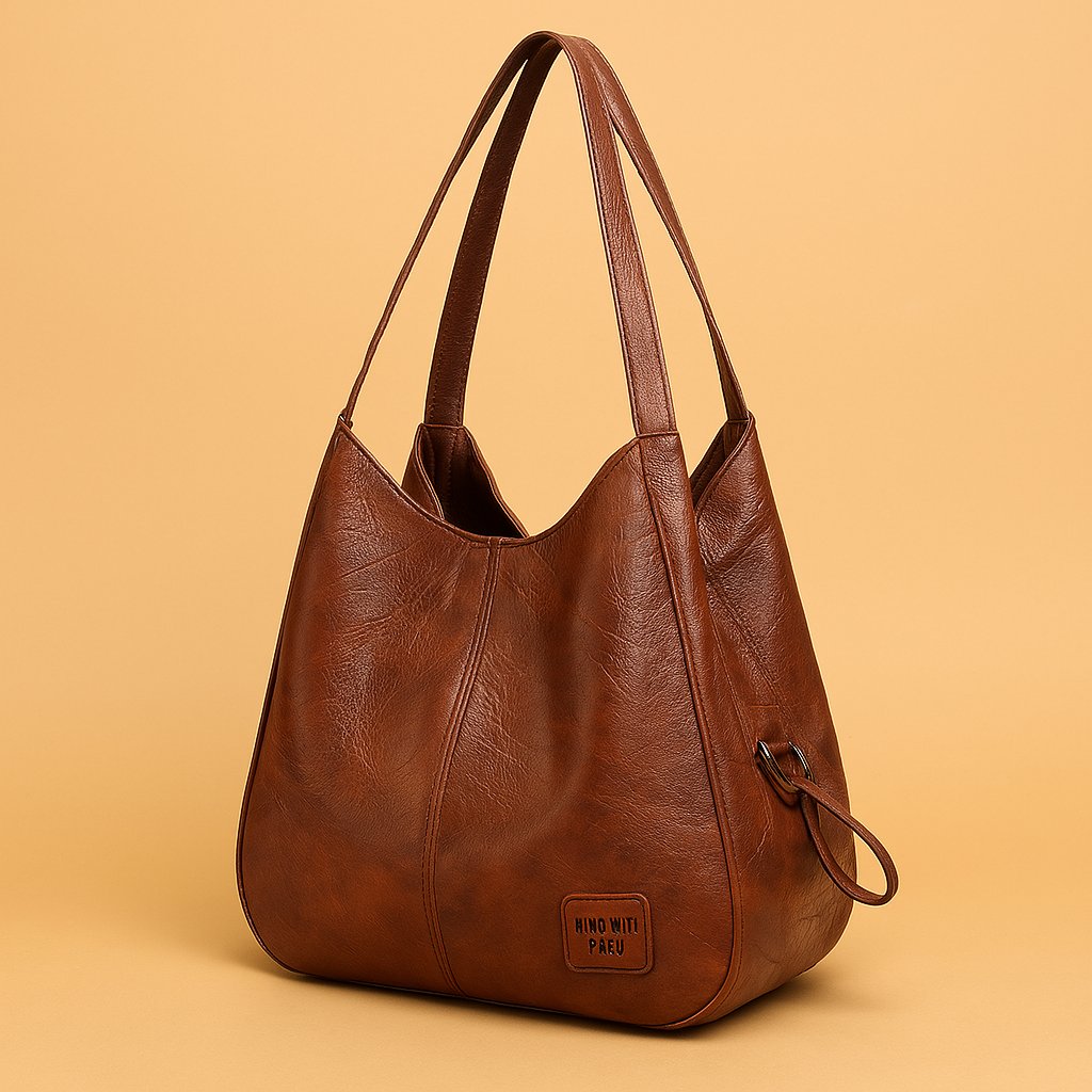 Women's vintage genuine leather hobo shoulder bag. Stylish & versatile brown everyday carry.
