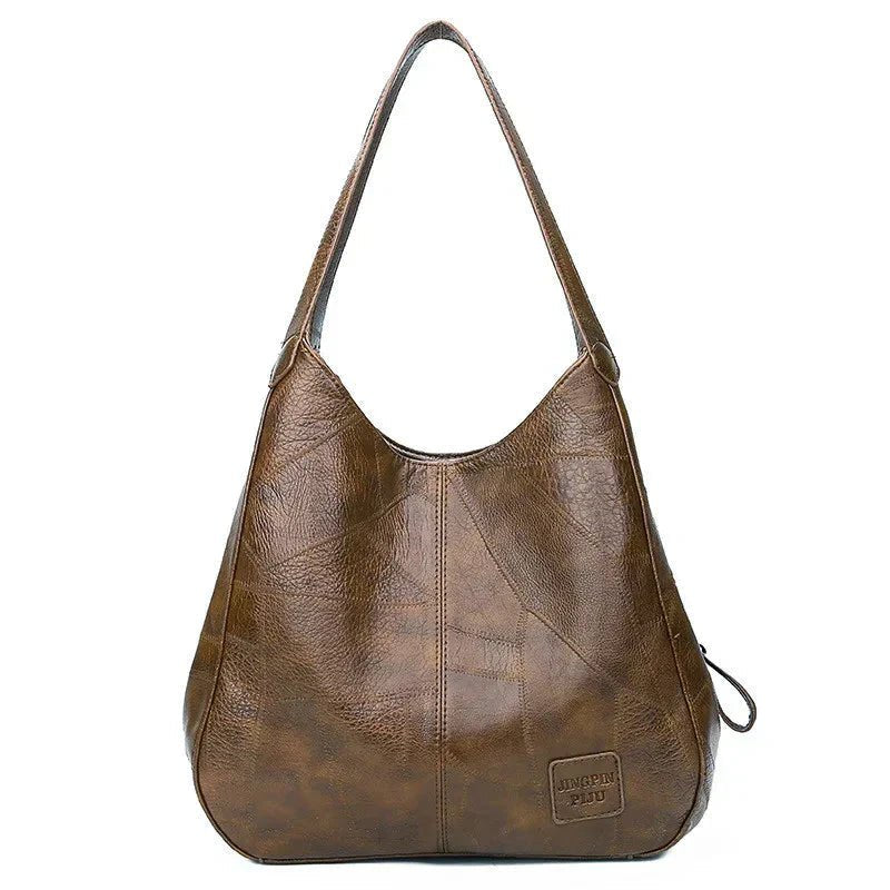 Classic coffee genuine leather hobo shoulder bag. Women's vintage versatile everyday handbag.