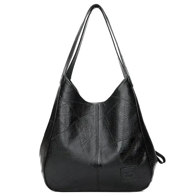 Women's vintage style genuine leather hobo bag. Versatile everyday carry shoulder bag in brown.