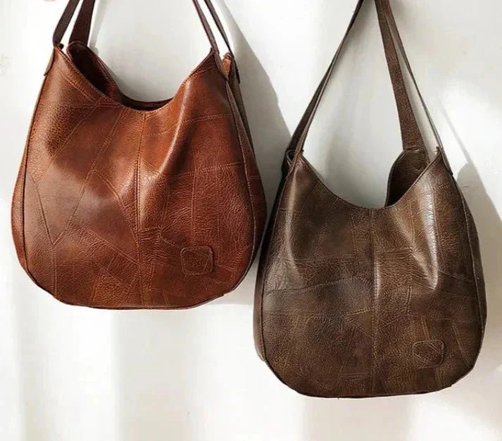 Brown genuine leather hobo shoulder bag. Women's vintage style versatile everyday handbag.