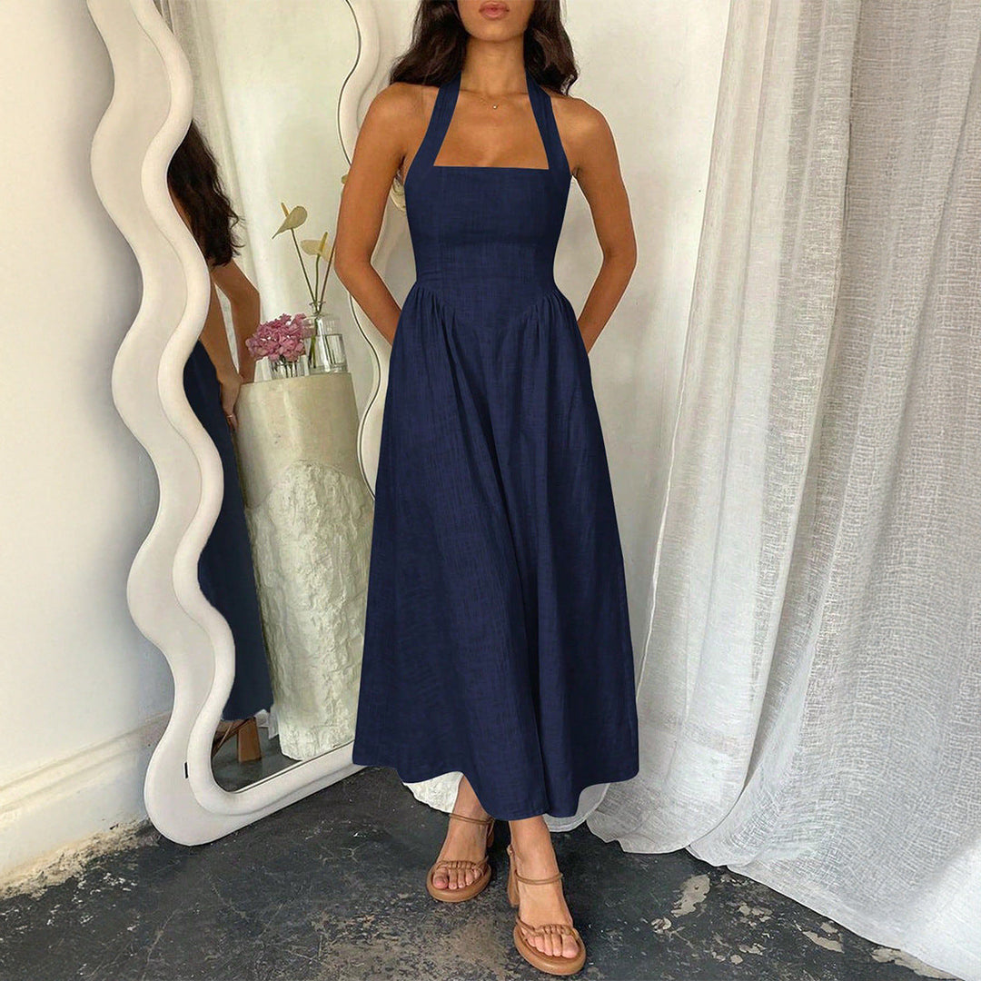 Retro-inspired halter neck A-line maxi dress, a timeless look for summer fashion.