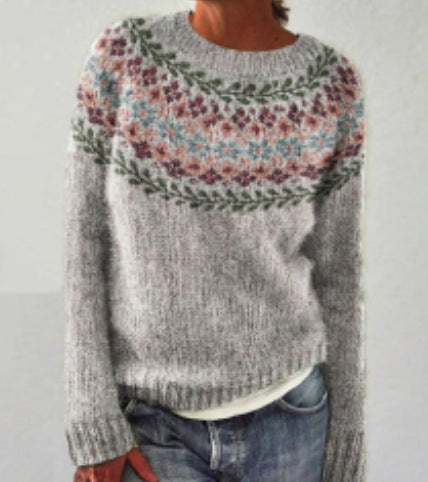 Vintage women's long-sleeve sweater, a warm knitted pullover and cozy top for stylish winter fashion.