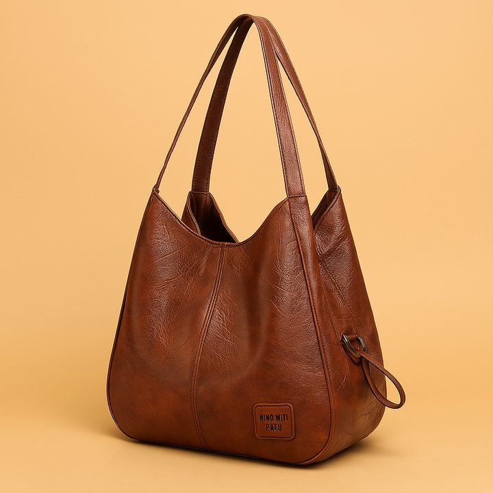 Women's vintage leather 4-piece handbag set, featuring a shoulder bag, crossbody, clutch, and matching wallet.