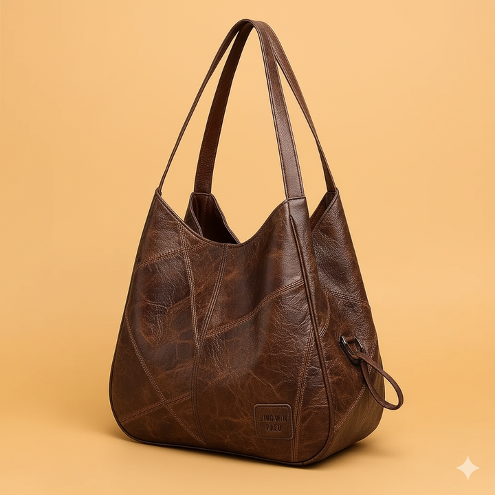 Elegant women's vintage leather shoulder bag, main piece of the 4-piece collection, showcasing classic design.