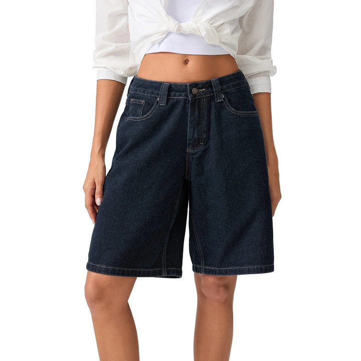 Fashionable women's relaxed denim shorts with a vintage look and low rise fit, perfect for summer.
