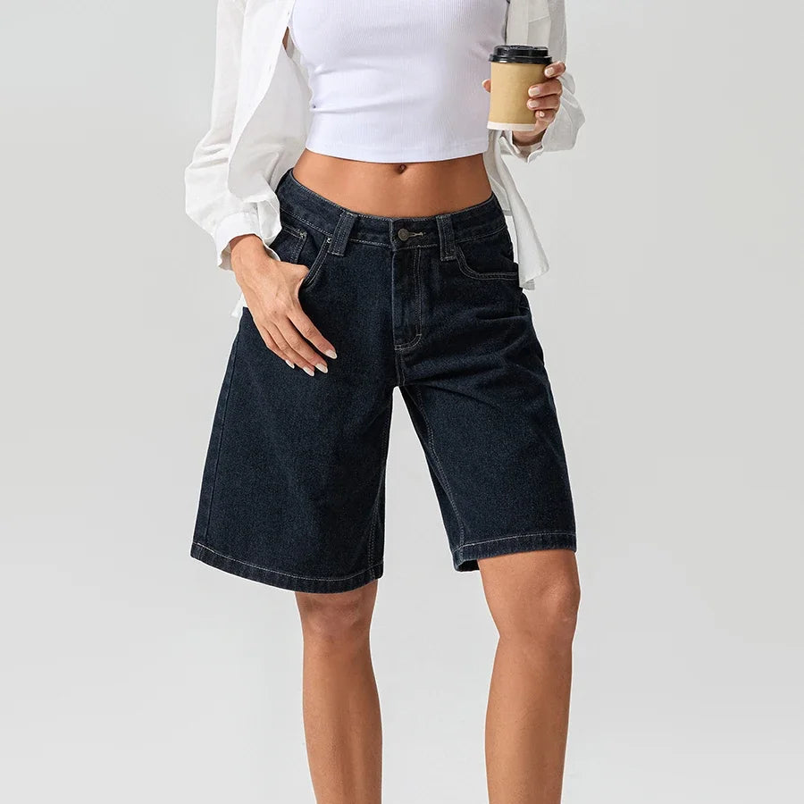 Timeless women's low rise relaxed denim shorts in vintage style, essential for summer casual fashion.