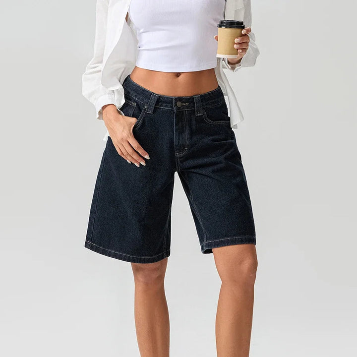 Timeless women's low rise relaxed denim shorts in vintage style, essential for summer casual fashion.