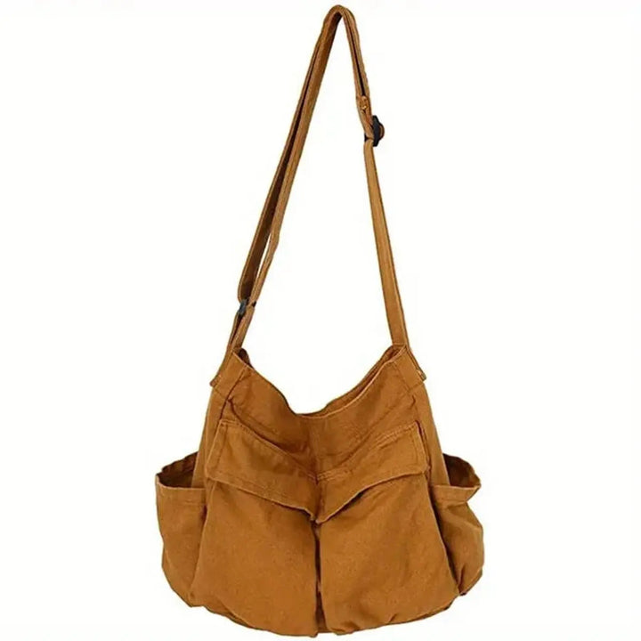 Durable vintage canvas multi-pocket shoulder bag for women, a functional and stylish everyday accessory.