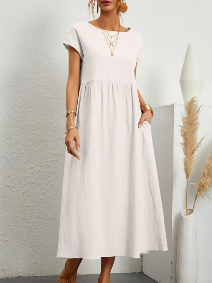Women's vintage O-neck midi dress, elegant & versatile for spring, summer, fall. Classic everyday fashion.