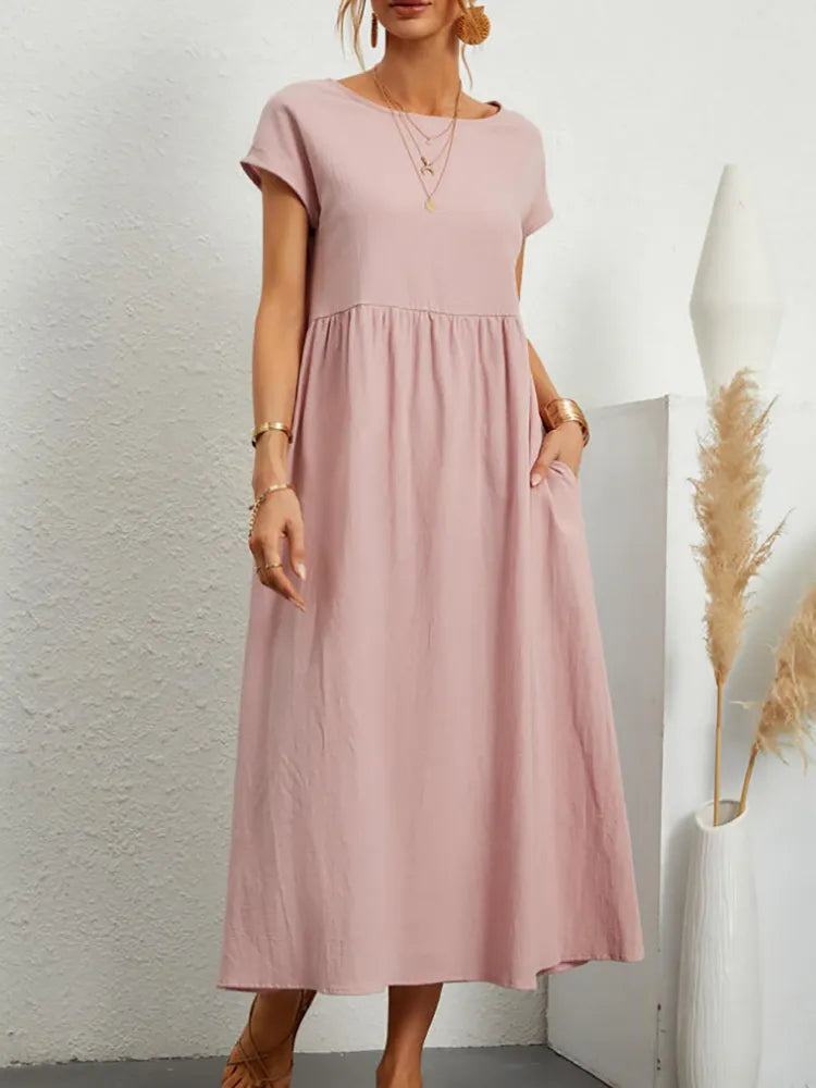 Women's vintage style O-neck midi dress, a comfortable & classic choice for spring & fall fashion.