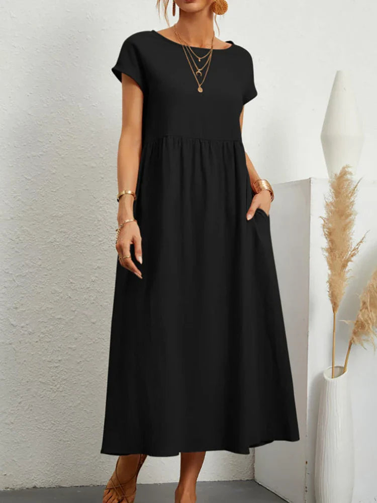 Sophisticated women's O-neck midi dress, vintage style, offering versatile comfort for all seasons.