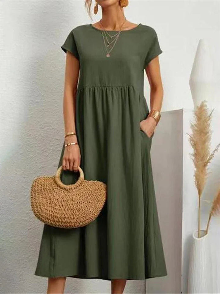 Comfortable women's vintage style O-neck midi dress, perfect for elegant spring & summer wear.