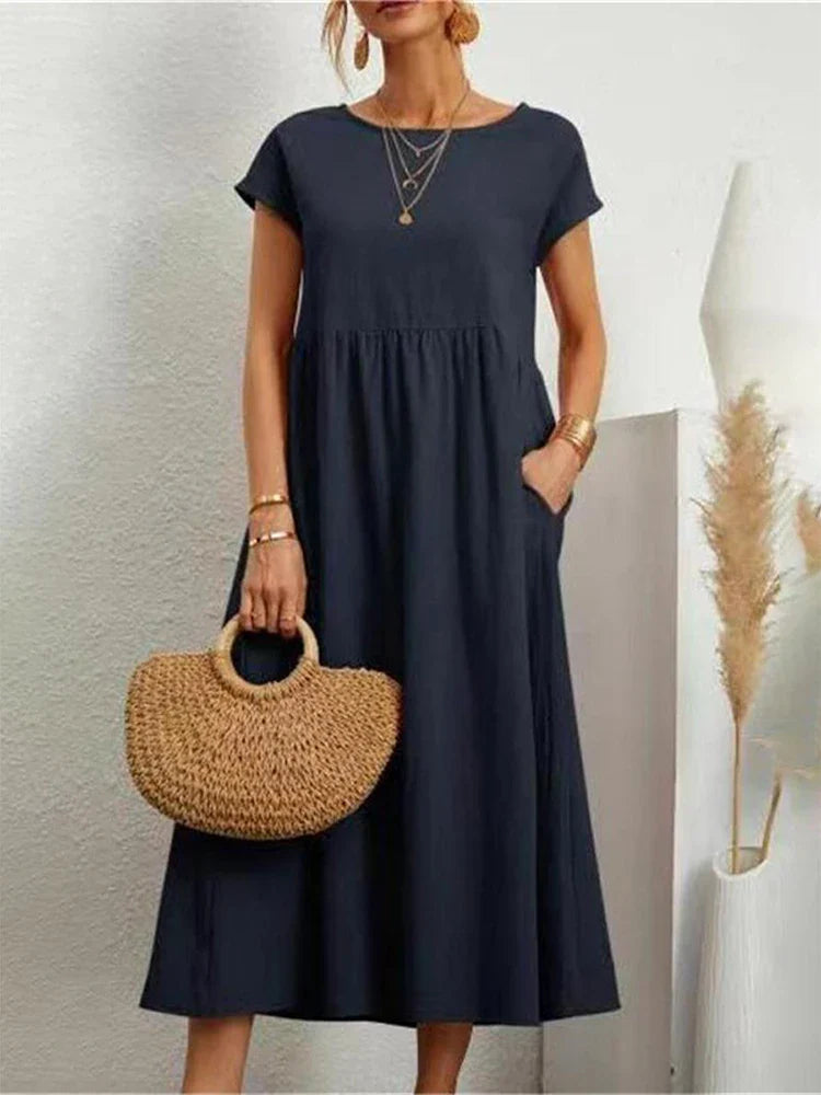 Women's vintage O-neck midi dress, comfortable & chic for spring, summer, and fall everyday fashion.