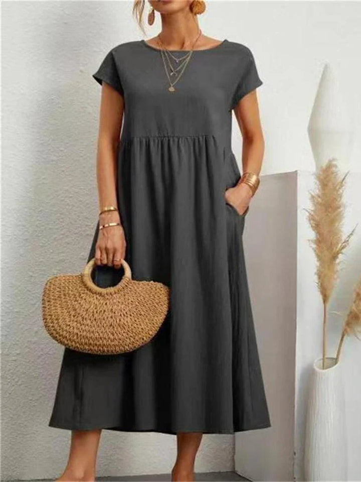 Versatile women's vintage style O-neck midi dress, perfect for elegant spring & summer occasions.