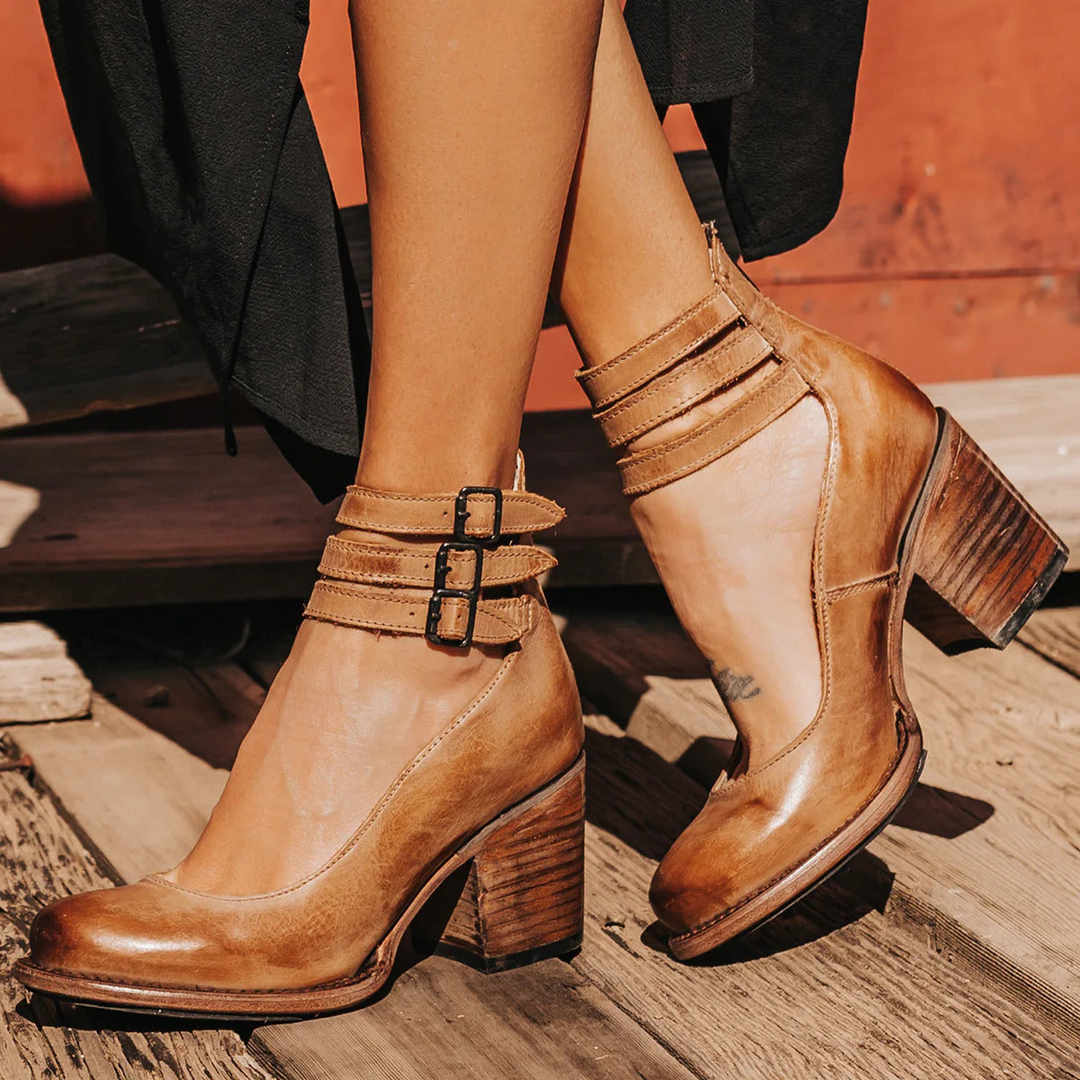 Classic women's block heel sandals, vintage design with stylish ankle straps.