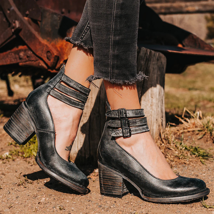 Elegant strappy heels for women, featuring a comfortable block heel and secure ankle strap.