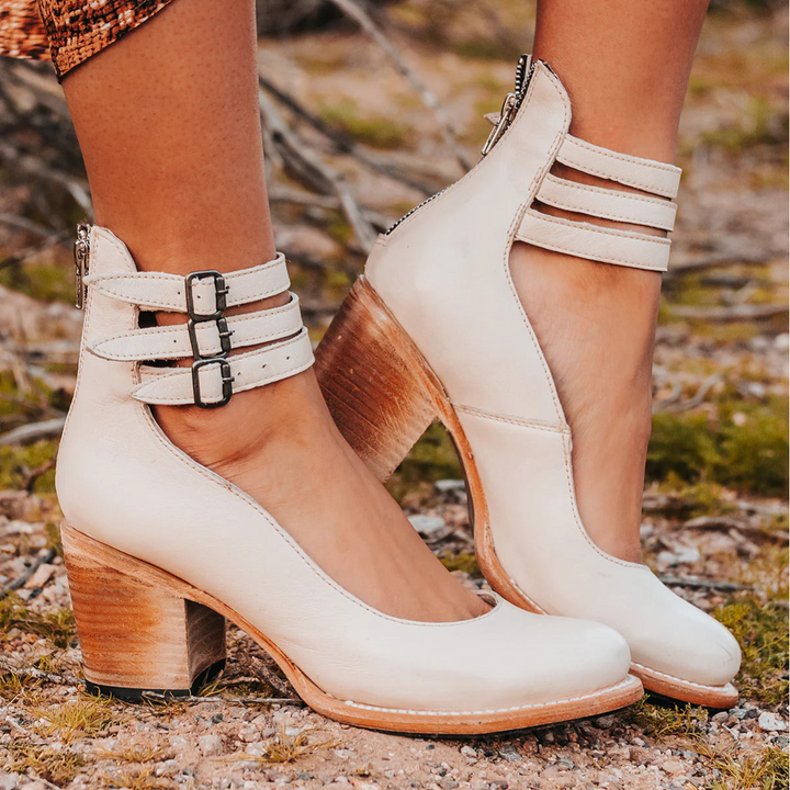 Fashionable vintage-inspired heels, women's ankle strap design with sturdy block heel.
