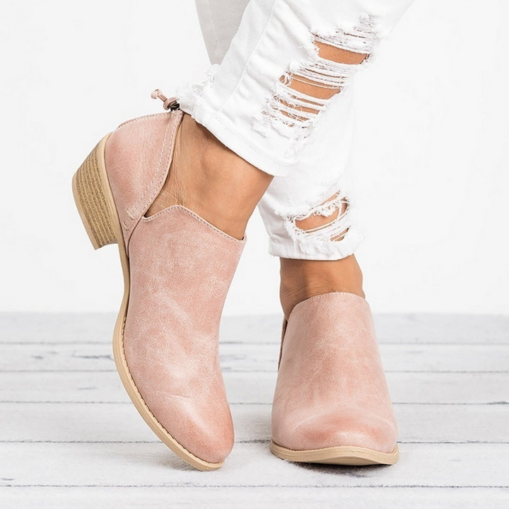 Women's vintage style ankle boots with comfortable block heel for all-day wear. Perfect retro footwear.
