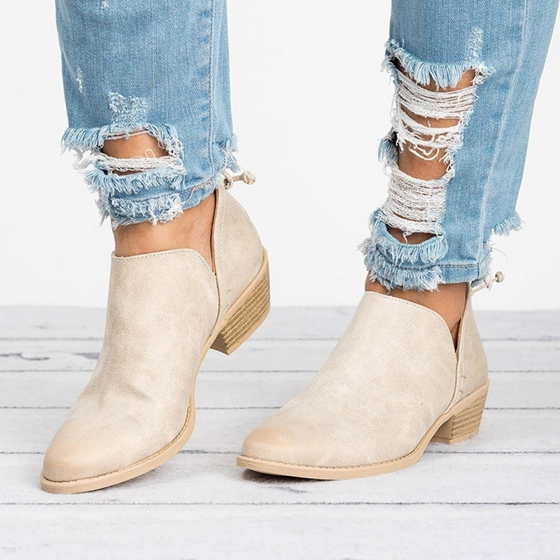 Comfortable women's vintage style ankle boots. Block heel slip-on footwear for elegant everyday fashion.