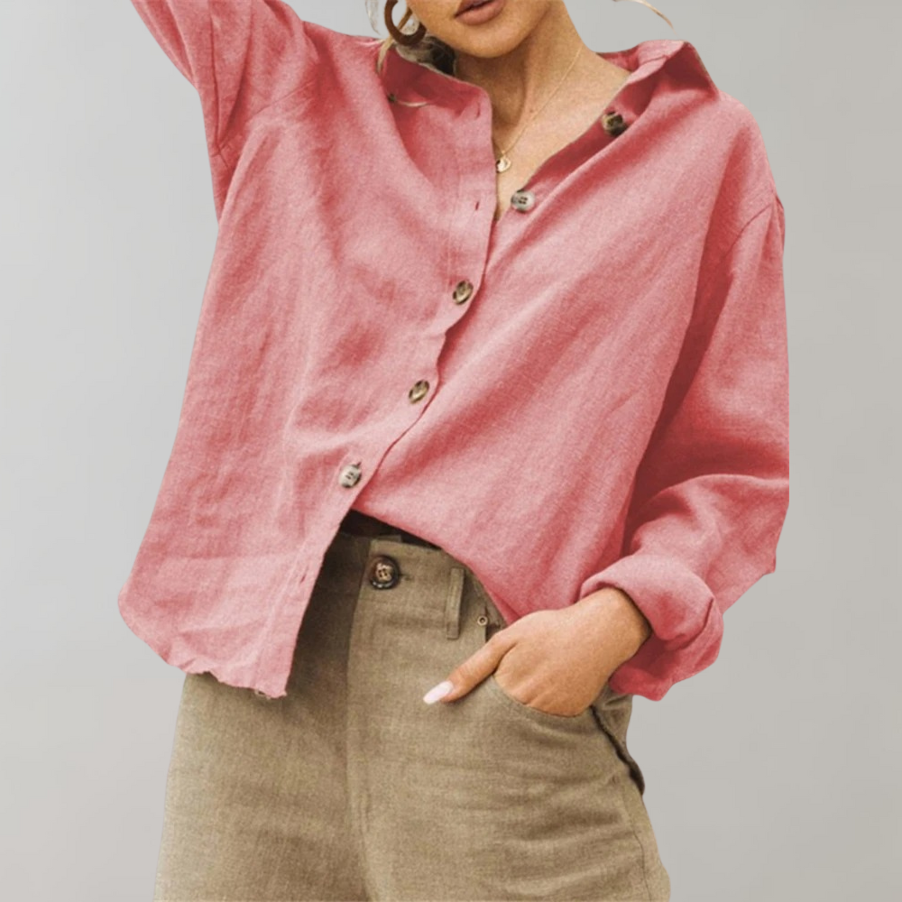 Long sleeve women's vintage blouse in a relaxed fit with a classic collar. Versatile for casual or elegant styling.