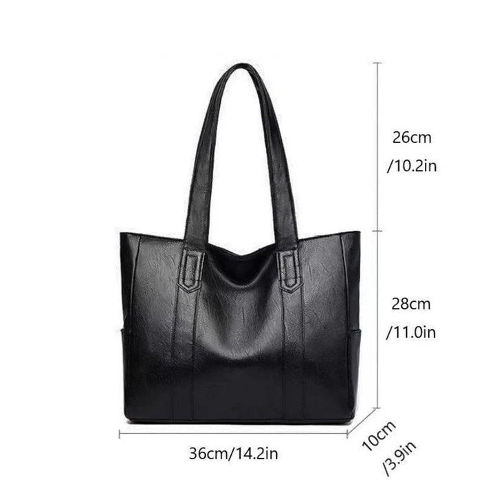 Versatile women's vintage shoulder bag. Classic black or brown handbag, perfect fashion accessory.