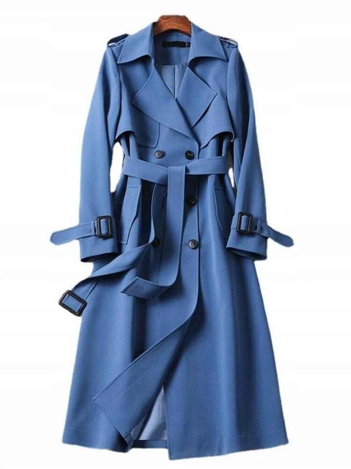 Classic women's blue vintage trench coat, blending timeless elegance with modern comfort for autumn fashion.