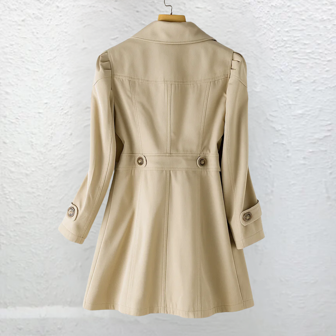 Women's vintage trench coat with classic collar, tailored for elegant, timeless style. Perfect all-season outerwear.