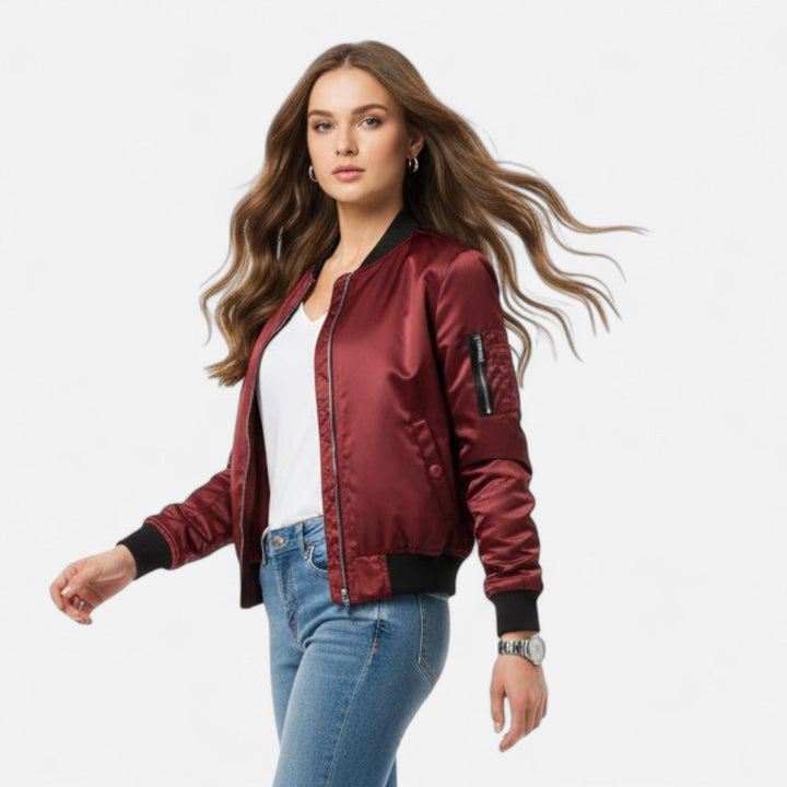 Chic women's bomber jacket, vintage-inspired with a zip front, ideal for fall & spring fashion.