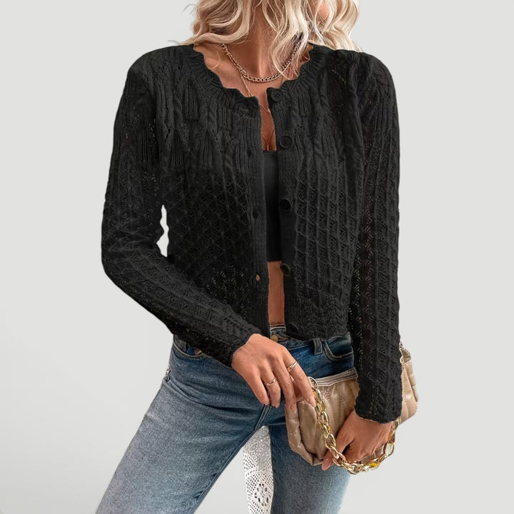 Folded violet lightweight women's summer cardigan sweater, perfect for travel & easy packing.