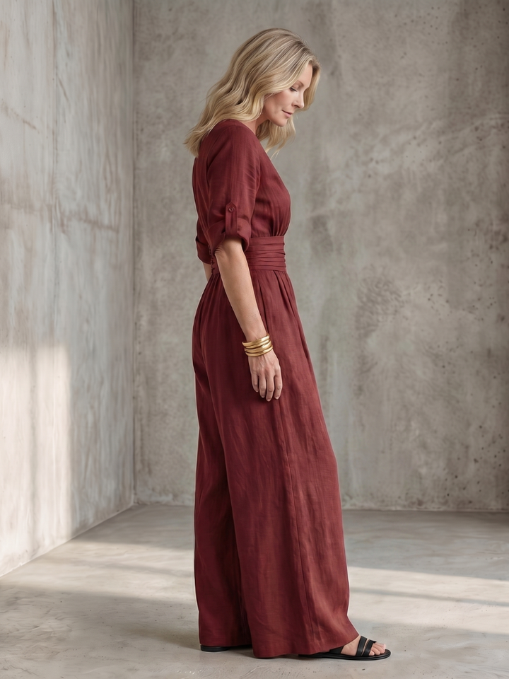 Full length view of a yellow Wanda cross front wide leg jumpsuit, stylish for women.