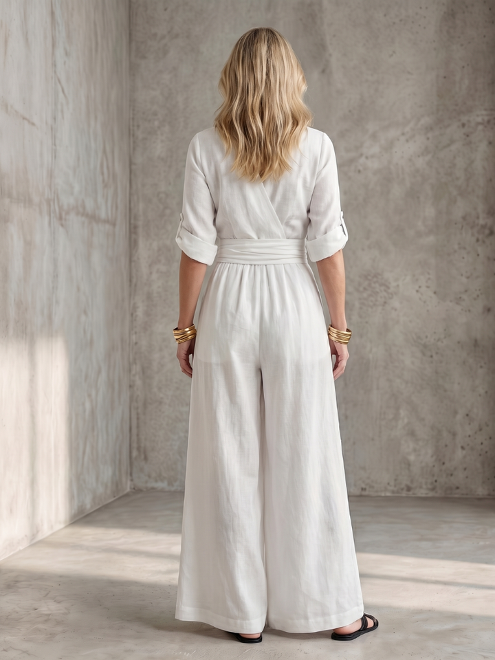 Stylish yellow cross front wide leg jumpsuit, a comfortable women's summer outfit.