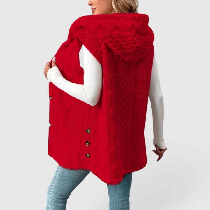 Warm women's vest with hood and buttons, excellent for everyday wear.