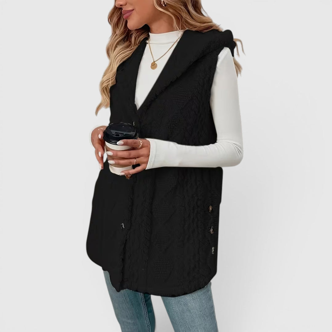 Women's versatile hooded button-front vest, a must-have for cool weather.