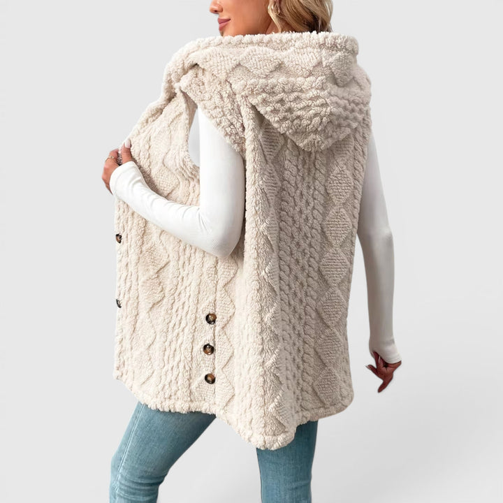 Cozy button-front hooded vest for women, ideal for autumn casual wear.