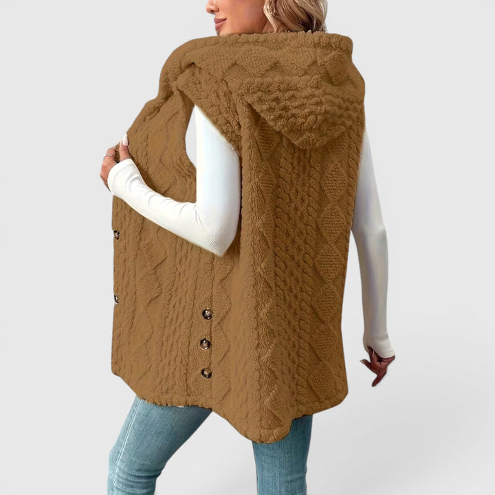 Stylish women's button-front hooded vest, perfect for chic layering.