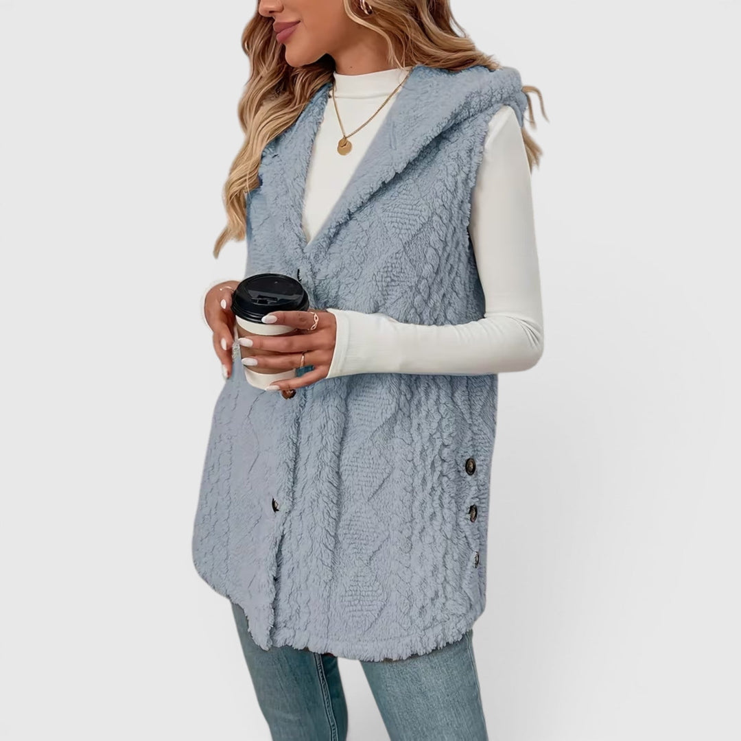 Chic women's warm vest, hooded and button-up, for versatile winter looks.