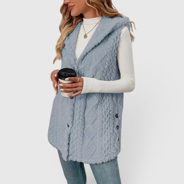 Chic women's warm vest, hooded and button-up, for versatile winter looks.