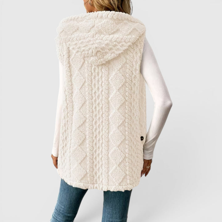 Women's casual chic hooded vest with convenient button front closure.