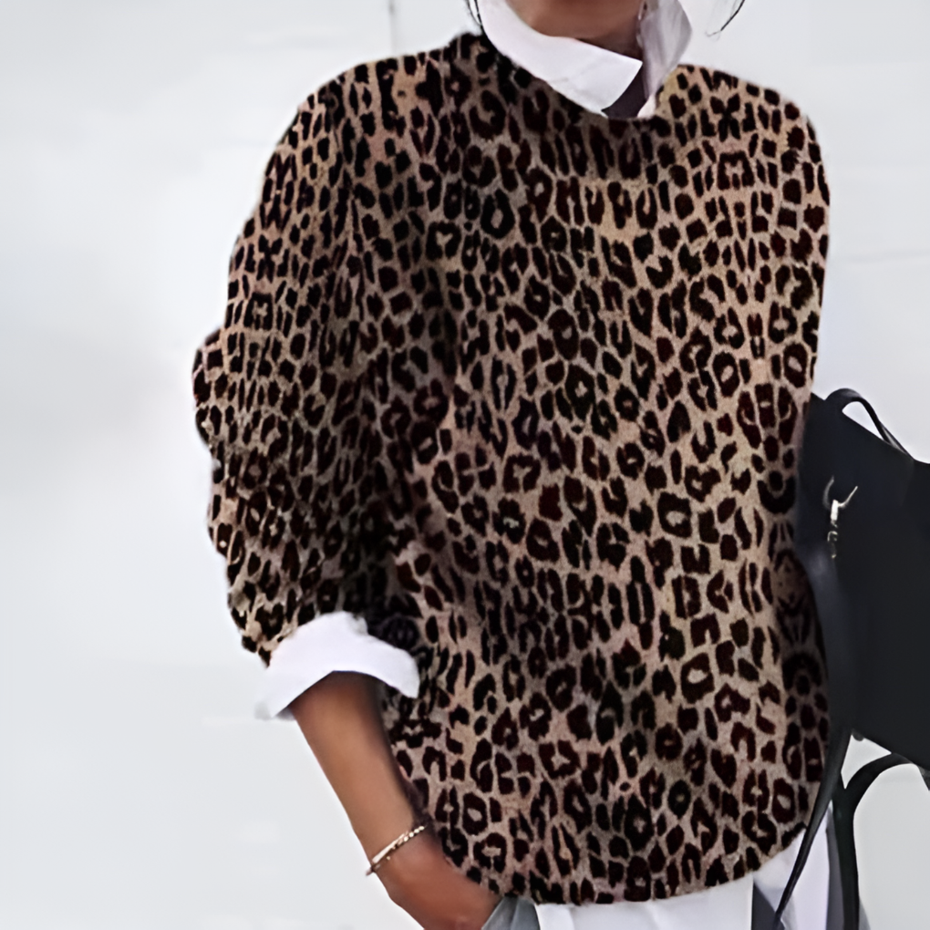 Comfortable women's stylish sweater. Perfect warm knitwear for fall and winter seasons. Casual everyday women's top.