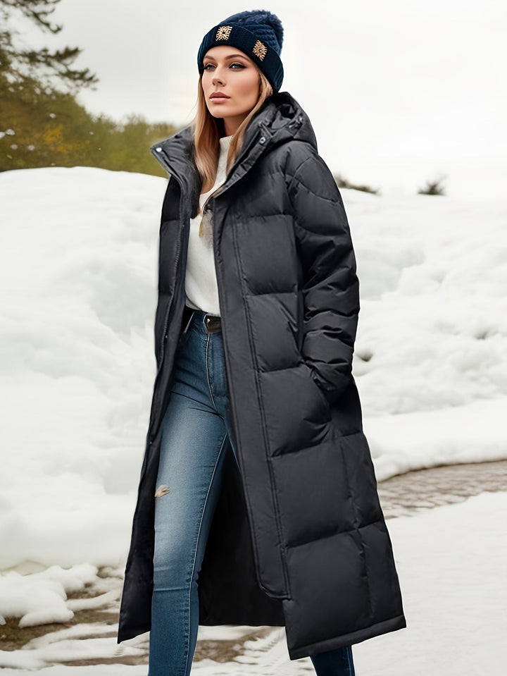 Durable women's long padded coat with hood, ideal warm winter jacket for daily comfort and style.