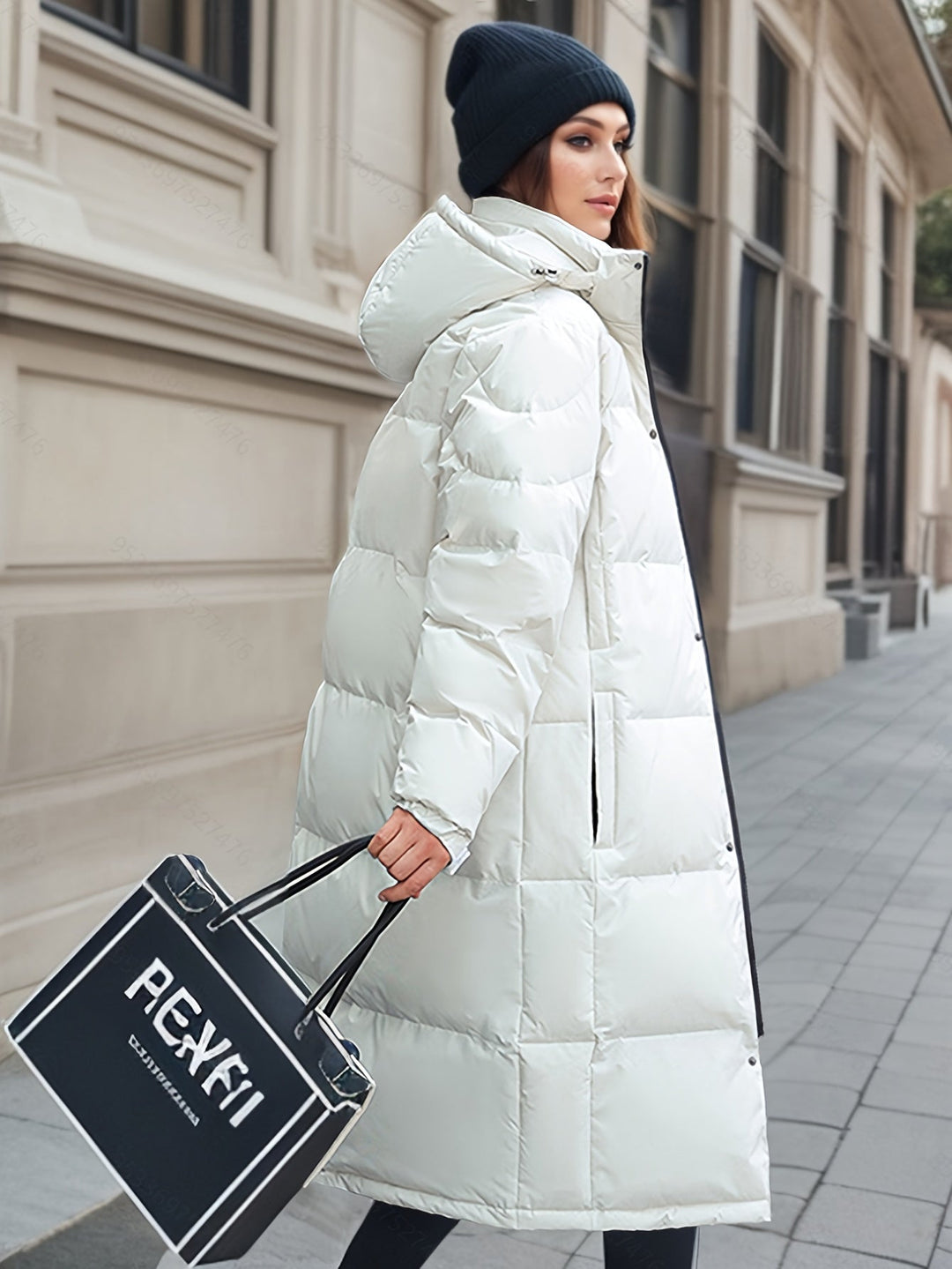 Fashionable women's long padded coat, a practical hooded jacket ensuring warmth and cozy wear this winter.