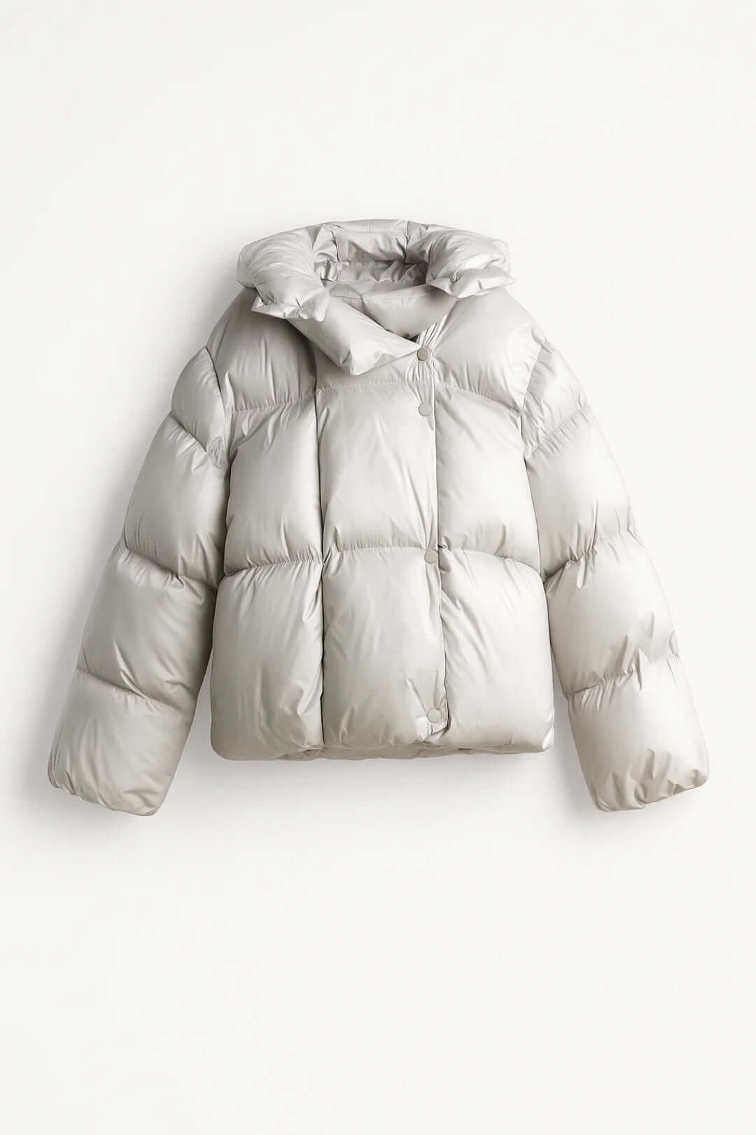 Women's warm puffer jacket with a modern voluminous design and chic style, perfect for winter. Trendy outerwear.