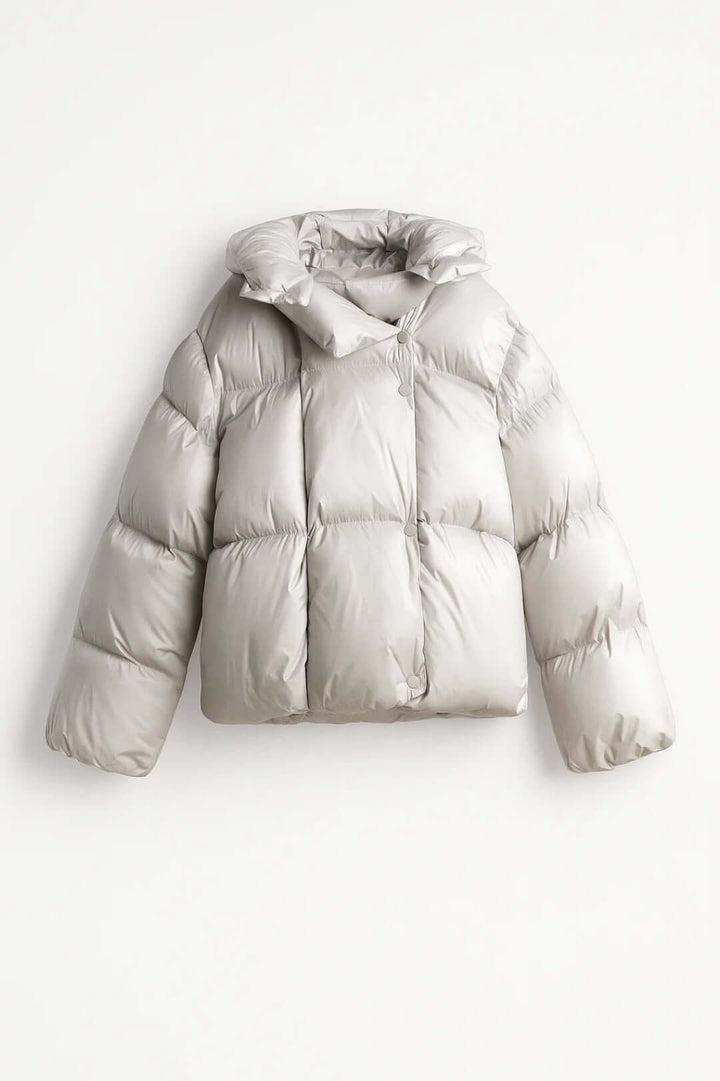Women's warm puffer jacket with a modern voluminous design and chic style, perfect for winter. Trendy outerwear.