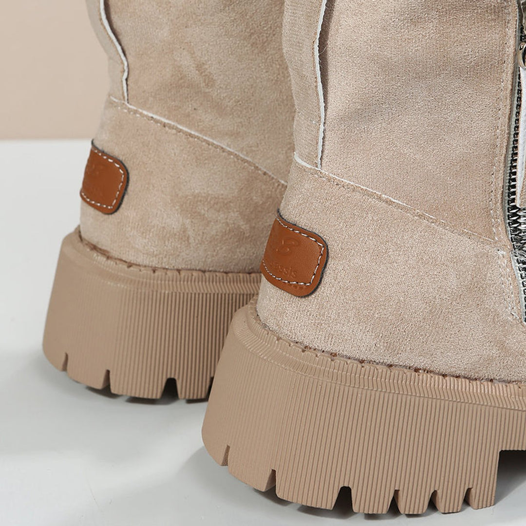 Women's warm winter ankle boots, easy slip-on design, cozy interior lining & a high-traction grip sole.