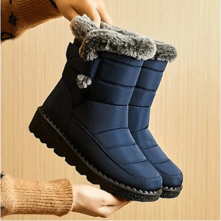Women's warm, waterproof winter snow boots with cozy faux fur lining, perfect for cold weather outdoor activities.