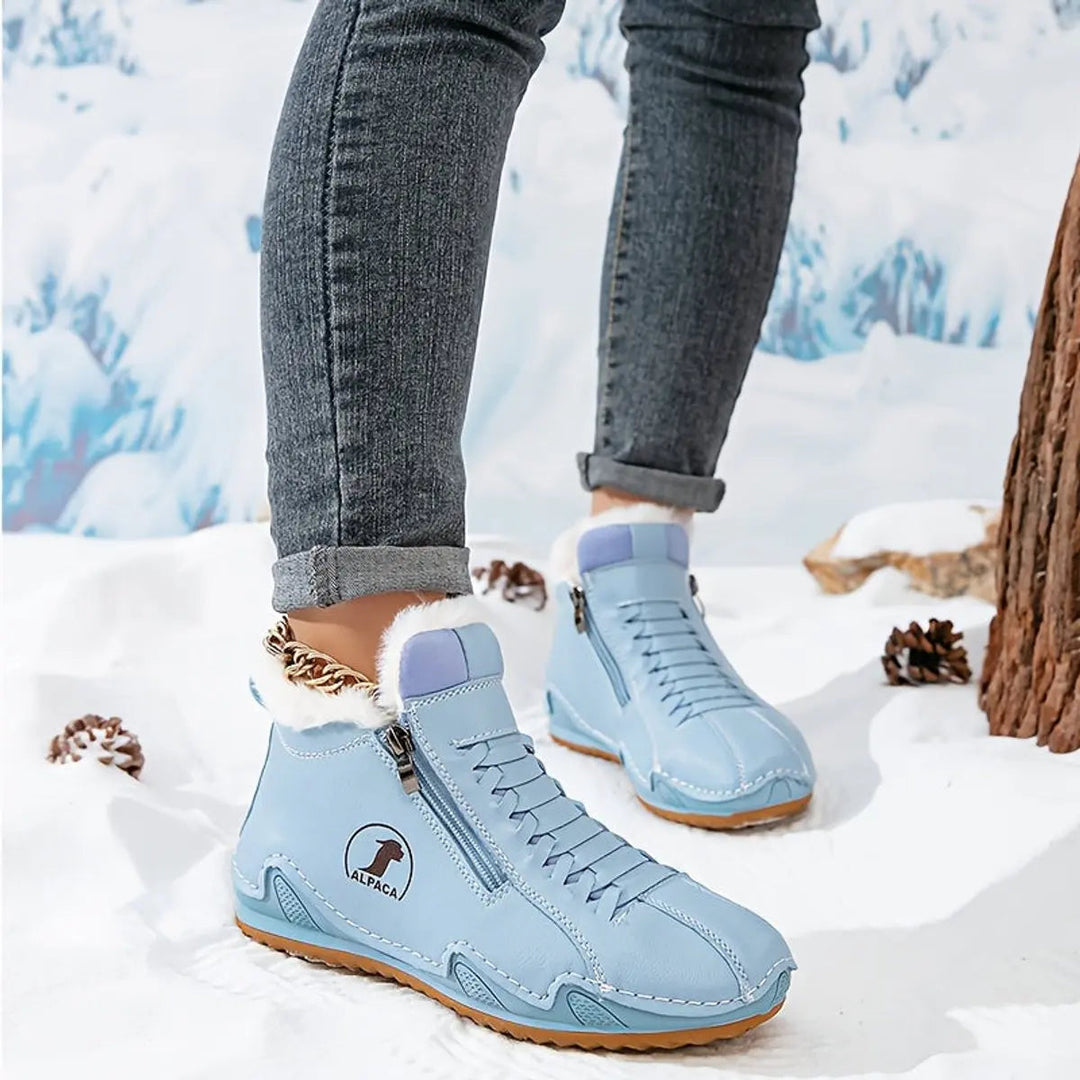 Women's warm winter ankle boots with a convenient zip-up design, perfect for snow & everyday comfort.